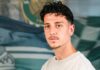 Neuer Offensivspieler: Albin Krasniqi wechselt zum SC Kriens Portrait of a young man with dark wavy hair, light facial hair, wearing a pale sweatshirt, looking at the camera.
