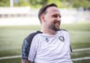 Schock für den Aufsteiger SC Kriens: Sliskovic verletzt Smiling man with short dark hair and beard on a soccer field, wearing a white jersey with a club crest and the number 9.